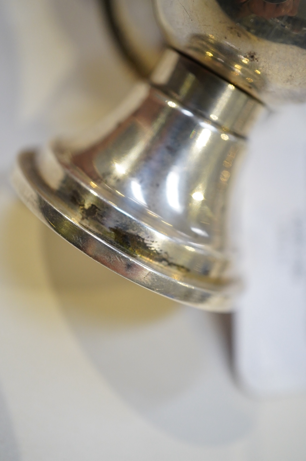 An Edwardian novelty cigar cutter and perpetual lighter, modelled as a pair of railway lamps, by Walker & Hall